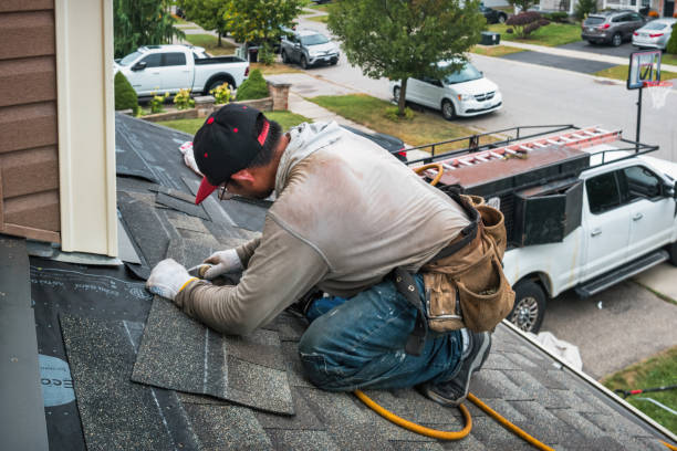 Professional Gutter Repair And Installation technician working in Hereford, PA